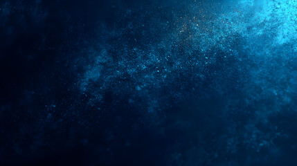 Fototapeta premium Abstract blue texture with shimmering particles in a dark background.