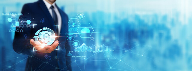 Automation: Businessman holding automation icon. Digital technology era of future. Advancements in...