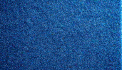 Close-up of a blue fuzzy fabric texture.
