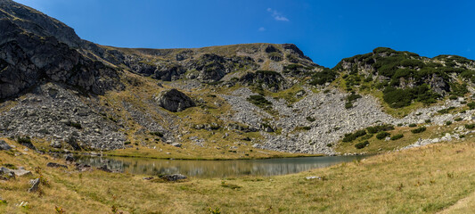 Panoramic view of Vidal lake in the Parang mountains, Romania. 