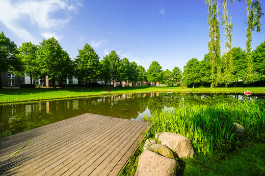 View of the frog pond in Rees.  City on the Rhine with a park.
