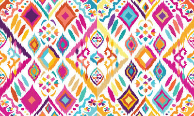 Abstract Ikat seamless pattern, perfect for ethnic-themed backgrounds, curtains, carpets, wallpapers, clothing, and decorations. Ideal for wrapping paper, batik,greeting cards, printing,creative uses. © K