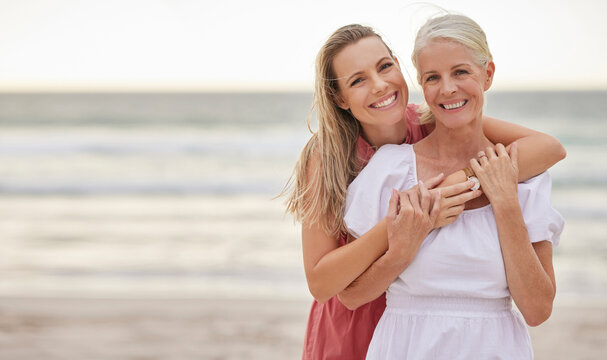 Portrait, beach and senior mom with daughter for bonding holiday, love and embrace on weekend travel. Nature, mother and woman smile on ocean adventure together with hug, fun and vacation with mockup