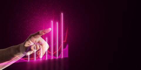 Close up of businessman hand using growing purple business chart on dark background with mock up place. Financial growth and trade concept.