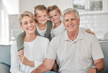 Obraz premium Happy, sofa and portrait of kids with grandparents in home for bonding, connection and family time. Smile, love and girl children relax with senior man and woman in living room at house in Australia.