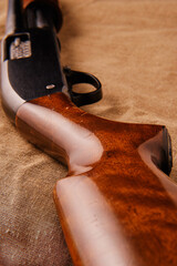 The buttstock bend of a good old 12 gauge pump shotgun