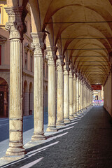 The enchanting arcade of Portico Chiesa San Giacomo in Bologna, Italy © Sergey
