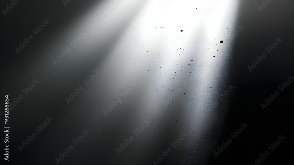 Poster light rays illuminating particles in a dark background.
