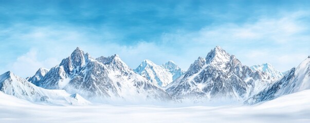 Fototapeta premium Snow-covered mountains beneath a clear blue sky, creating a peaceful winter scene