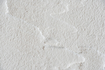 Concrete weathered surface waved texture white macro