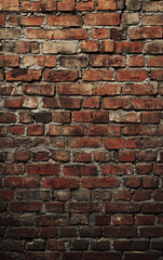 Obraz premium A brick wall with a few bricks missing