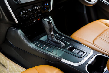 automatic transmission shift selector in the car interior. Closeup a manual shift of modern car...