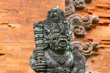 Large Ancient, moss and lichen covered Balinese Angkul-angkul (Home or Temple Entrance Gates), with Bedogol or Dwarapala Dvarapala Dvarapalaka (Gate Guardians) in front. Moss covered.