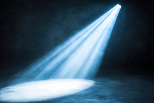 Majestic spotlight beam illuminating darkness