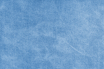 Closeup, macro blue grunge jeans denim fabric texture background, cloth with diagonal weawing
