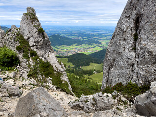 Close to the peak of the Kampenwand mountain with surrounding big rocks and stones
