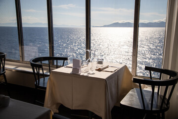 restaurant table and the sea in the background