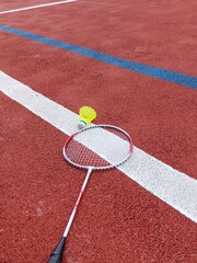 racket and shuttlecock