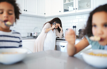 Mother, phone call and stress in home with children for bad news, headache and conversation in kitchen. Woman, kids and smartphone with mental health, frustrated and anxiety for mobile chat in house