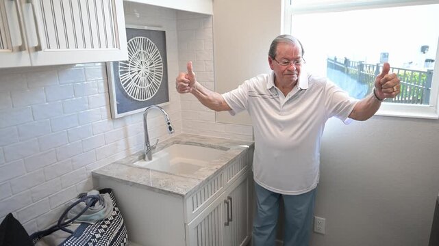 senior citizen pleased with the utility sink upgrade to the washroom