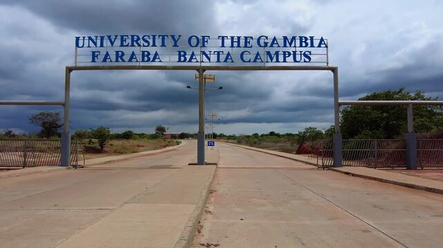 Gambia University UTG Faraba Banta Campus entrance signage tilt up view