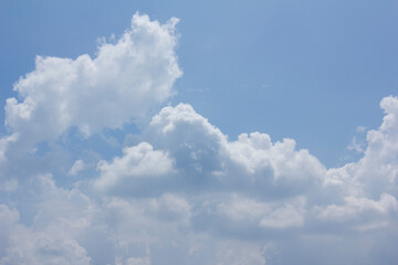 
Blue sky and white puffy clouds