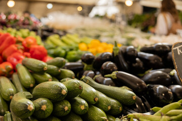 Close up zucchinis and aubergine, vegetable at the market in Rotterdam. Healthy food, market stall, raw food.