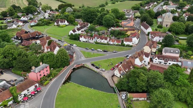 Old bridge and duck pond Finchingfield Village in Essex UK drone aerial view