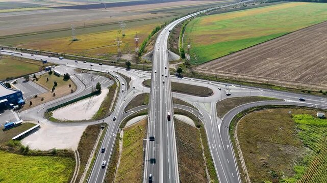 Drone footage of morning traffic on highways near Brasov