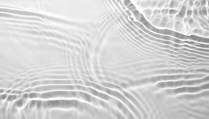 Obraz premium Blurred desaturated transparent clear calm water surface texture with splashes and bubbles. Trendy abstract nature background. White-grey water waves in sunlight.
