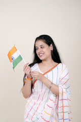 A Beautiful Indian Woman with the Tricolor Flag. Indian Independence Day, Indian Republic Day
