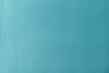 Texture of genuine leather, artificial leatherette blue background