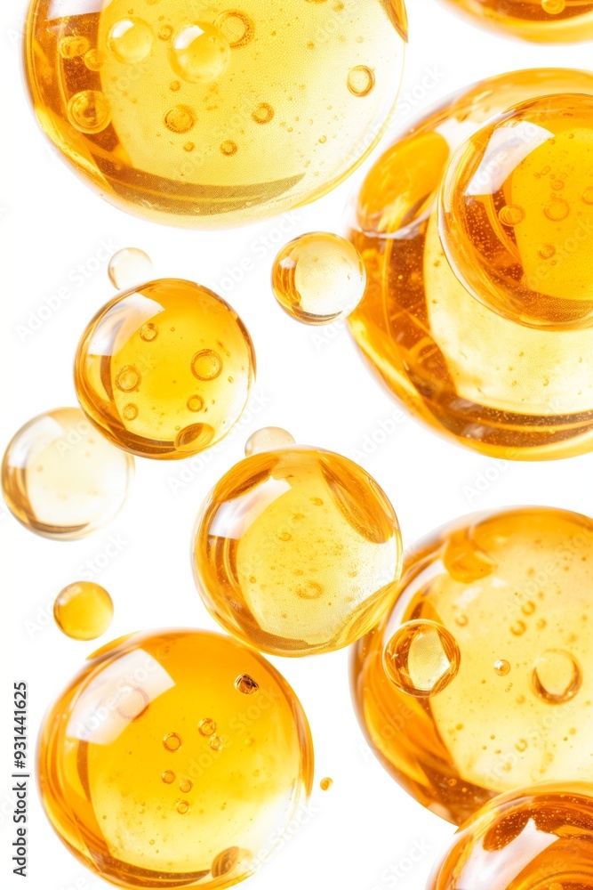 Poster a close up of many small yellow bubbles. the bubbles are all different sizes and are floating in the