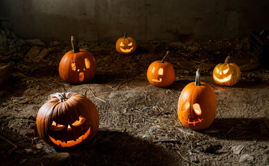 halloween background with jack'o'lanterns in the night