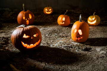 halloween background with jack'o'lanterns in the night