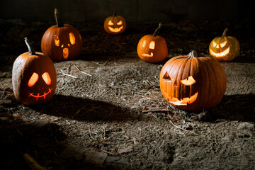 halloween background with jack'o'lanterns in the night