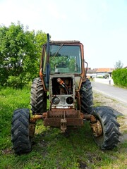 Hiking in the Argonne forest in France - View of a ruined tractor