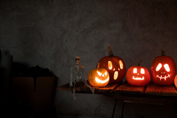 halloween background with jack'o'lanterns in the night