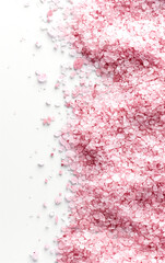 Pink bath salt on white background