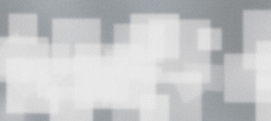 Abstract white geometric shapes on a grainy grey background