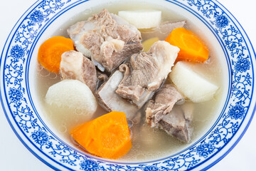 Chinese traditional soup - carrot, yam and pork bone soup