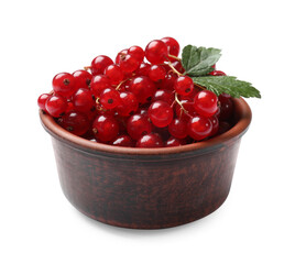 Ripe red currants with green leaves in bowl isolated on white