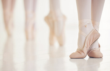 Studio, ballet and feet of students for practice, performance and rehearsal for dance competition. Ballerina, people and slippers in class for learning, creative or talent with balance in art academy