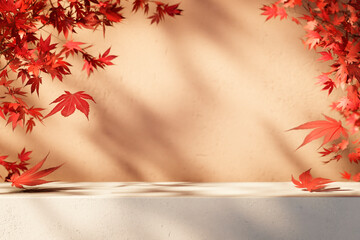 Autumn background scene with red maple leaves on table with sunlight. Natural seasonal home decor for fall season, thanksgiving and holiday showroom.