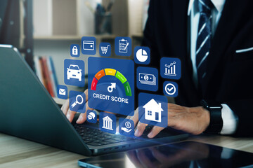 Credit score concept.Businessman evaluate customer statistical data with credit score icon. Online...