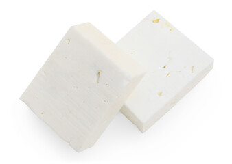Feta cheese blocks isolated on white background. Fresh Greek soft cheese top view.