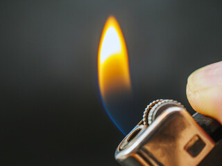 Flame emitted from a lighter, Close-up of flame switched on with lighter