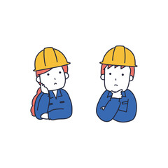 トラブルで困っているヘルメットを被った作業員の男女