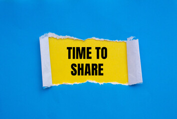 Time to share message written on ripped torn blue paper with yellow background. Conceptual time to...