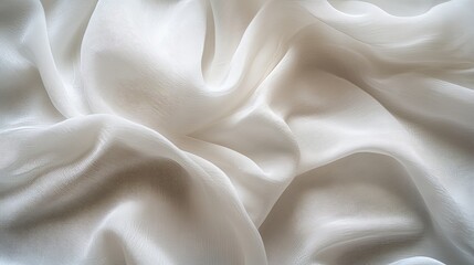 Obraz premium Detailed macro photograph of crumpled white fabric, emphasizing the fine details and delicate texture with soft, diffused lighting for a calming background.